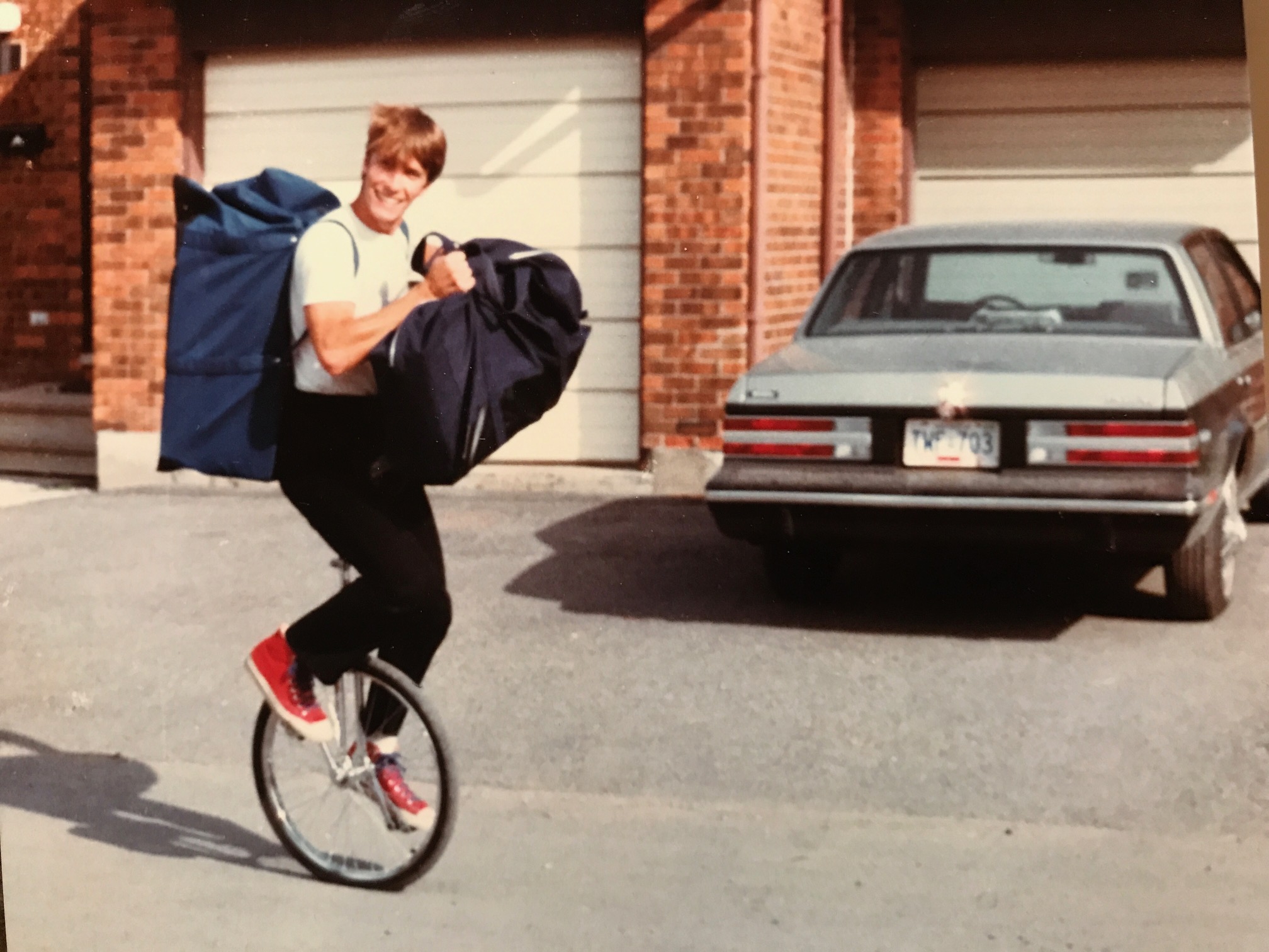 Chris Pilsworth rides his unicycle to his local magic show.